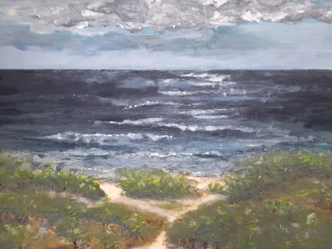 Painting: a grey cloud bank over a deep blue sea with white breakers; green dunes in front, a pale sand path forking towards the viewer.